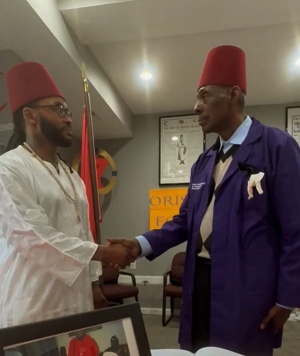 Grand Sheik Maurice Pennington Bey greeting Chief Supreme Grand Sheik Clarence Prather-El
